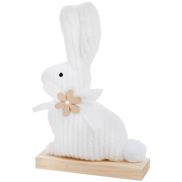 Conejo de Pascua en pie de madera