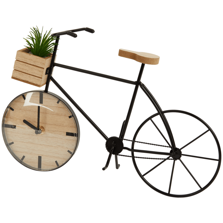 Bicicleta reloj con planta