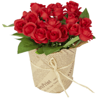 Roses artificielles dans un vase en papier
