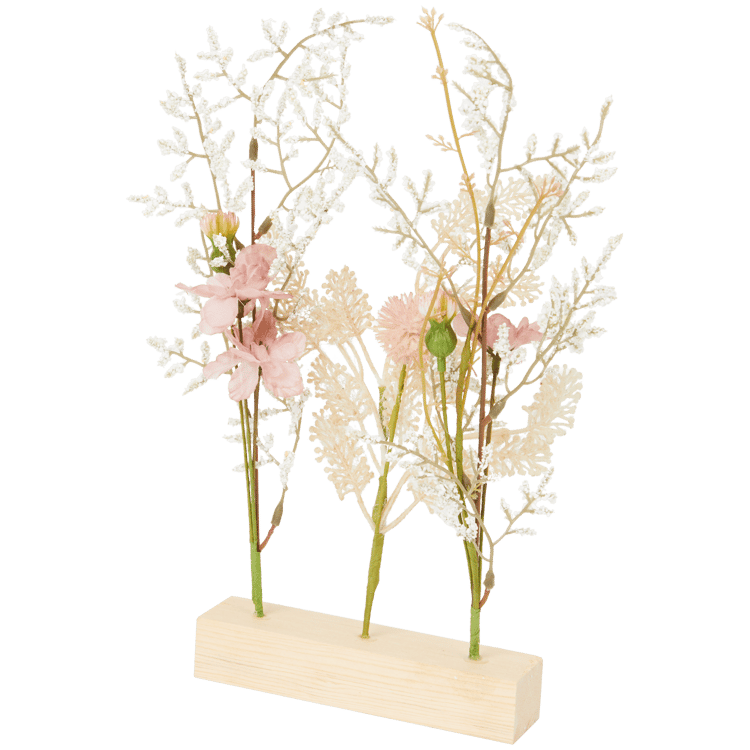 Flores secas artificiales sobre base de madera