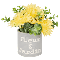 Umělá květina v květináči s nápisem
